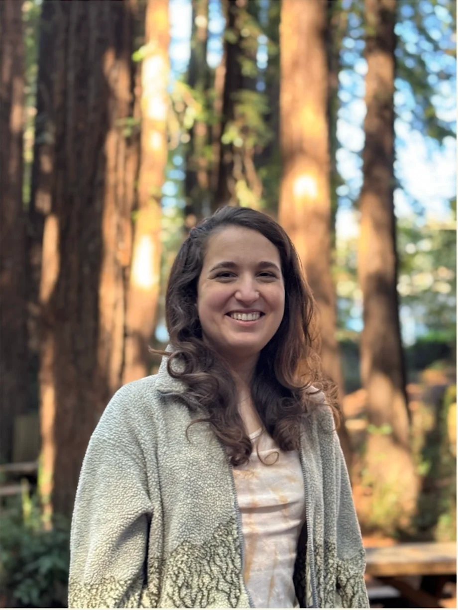 Jessie Lindsey standing among redwood trees
