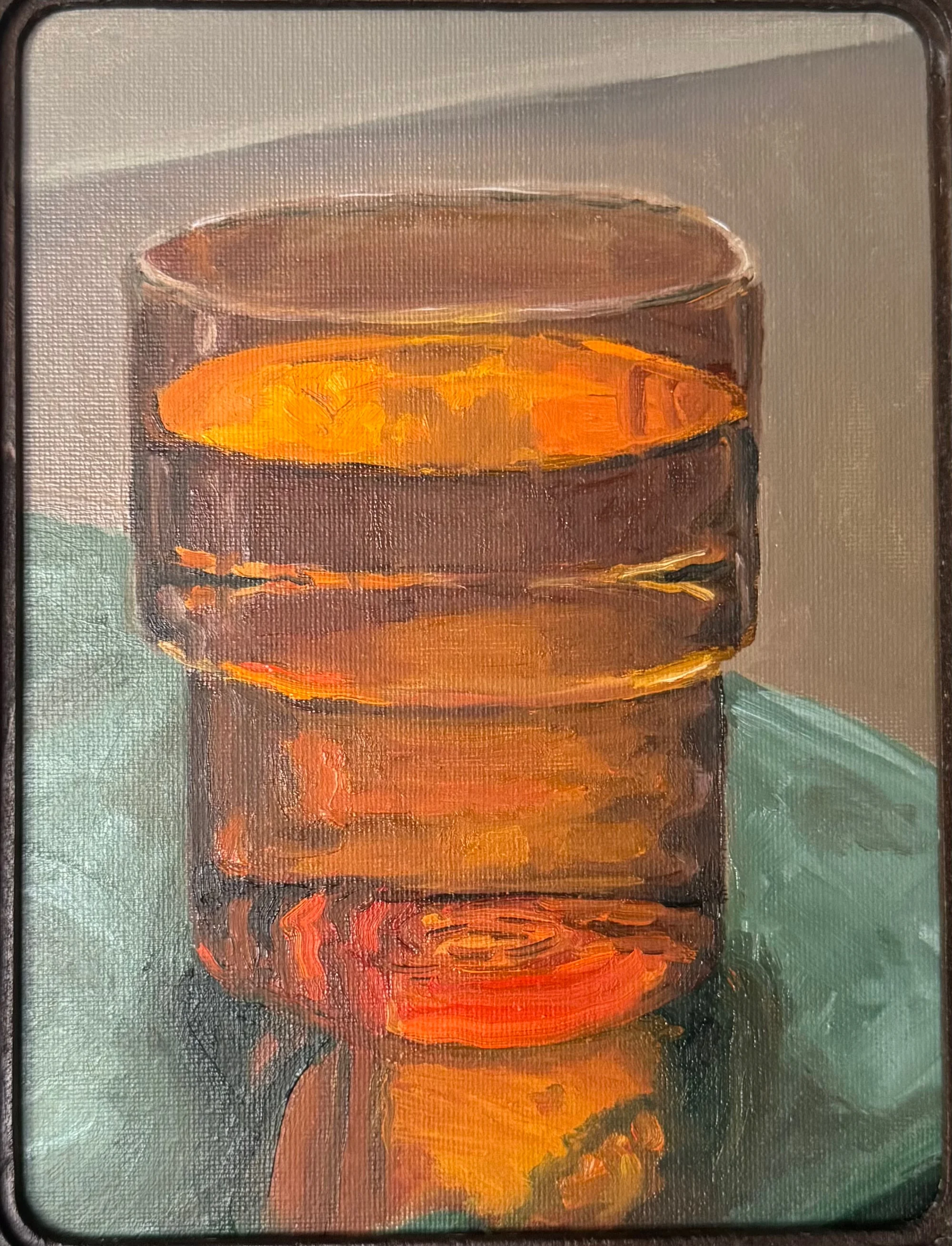 Still life painting of an amber glass on a teal surface with light passing through